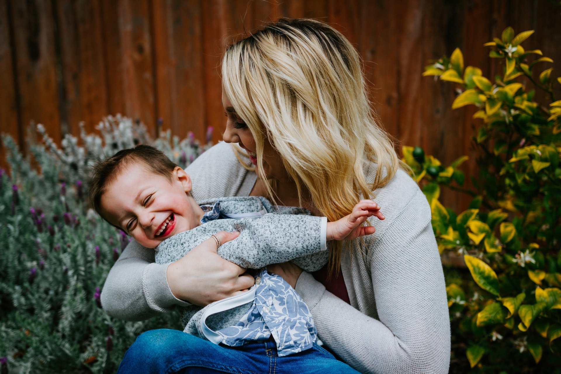 A mother holding her son