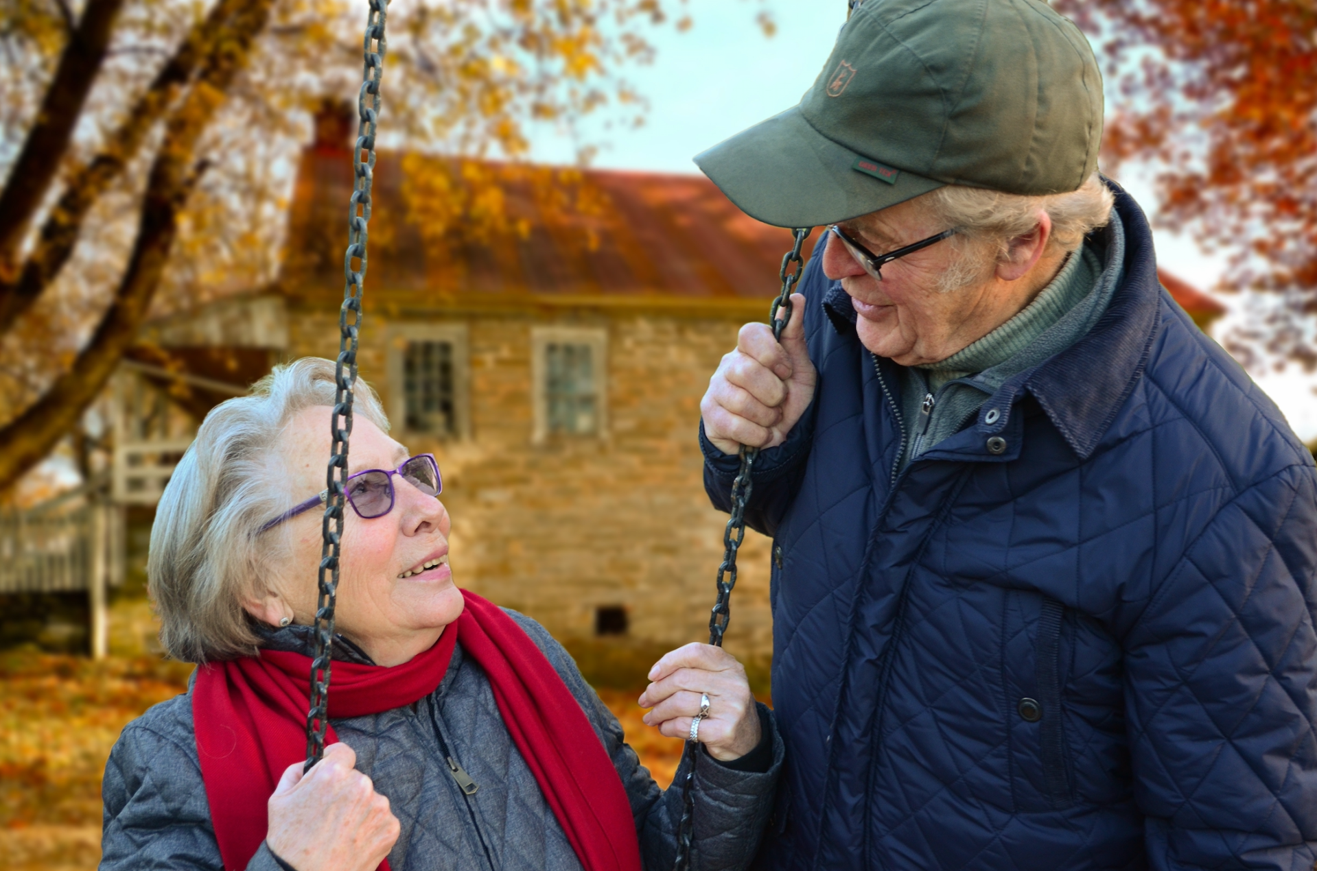 Elderly couple looking at each other