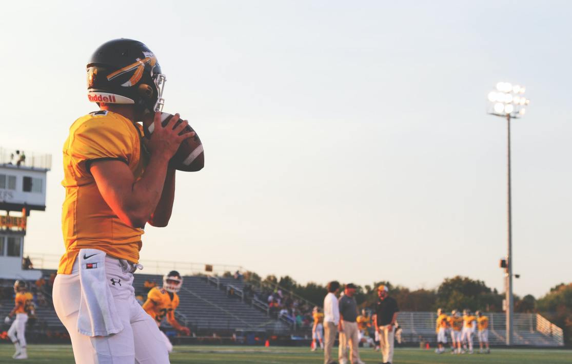 Football player about to throw the ball