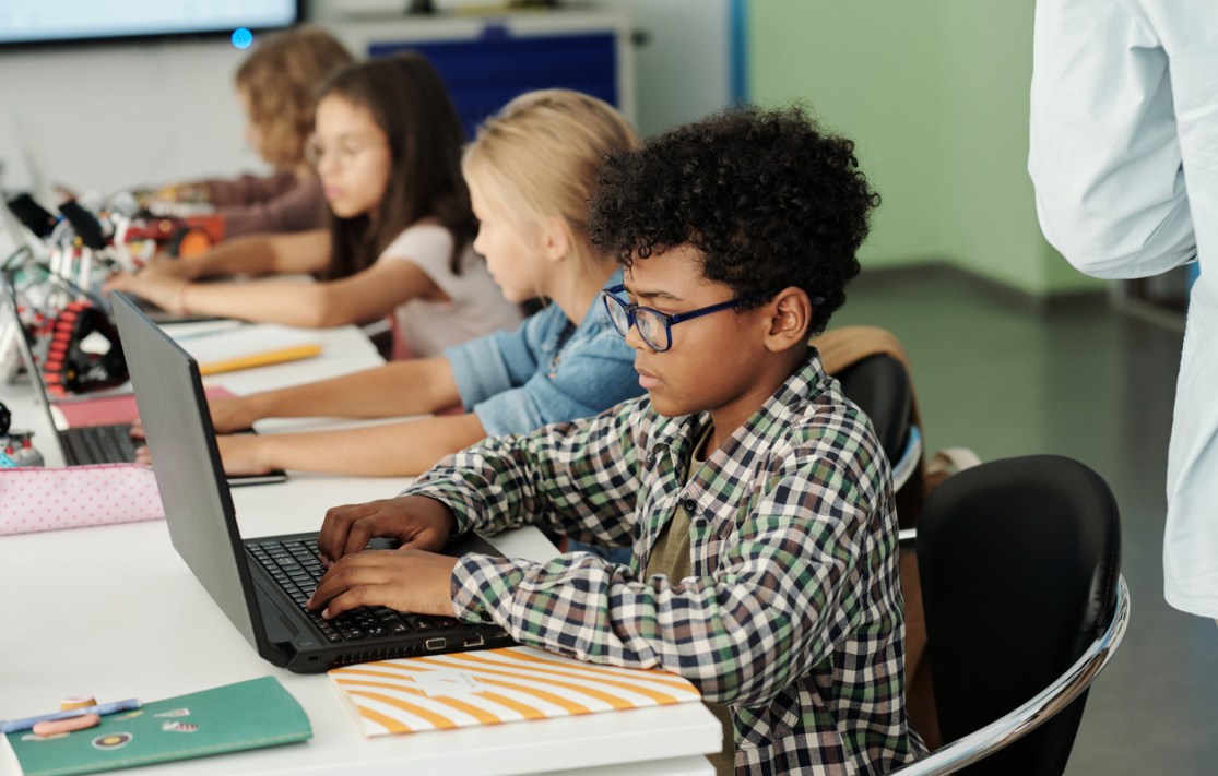 school children working on computers