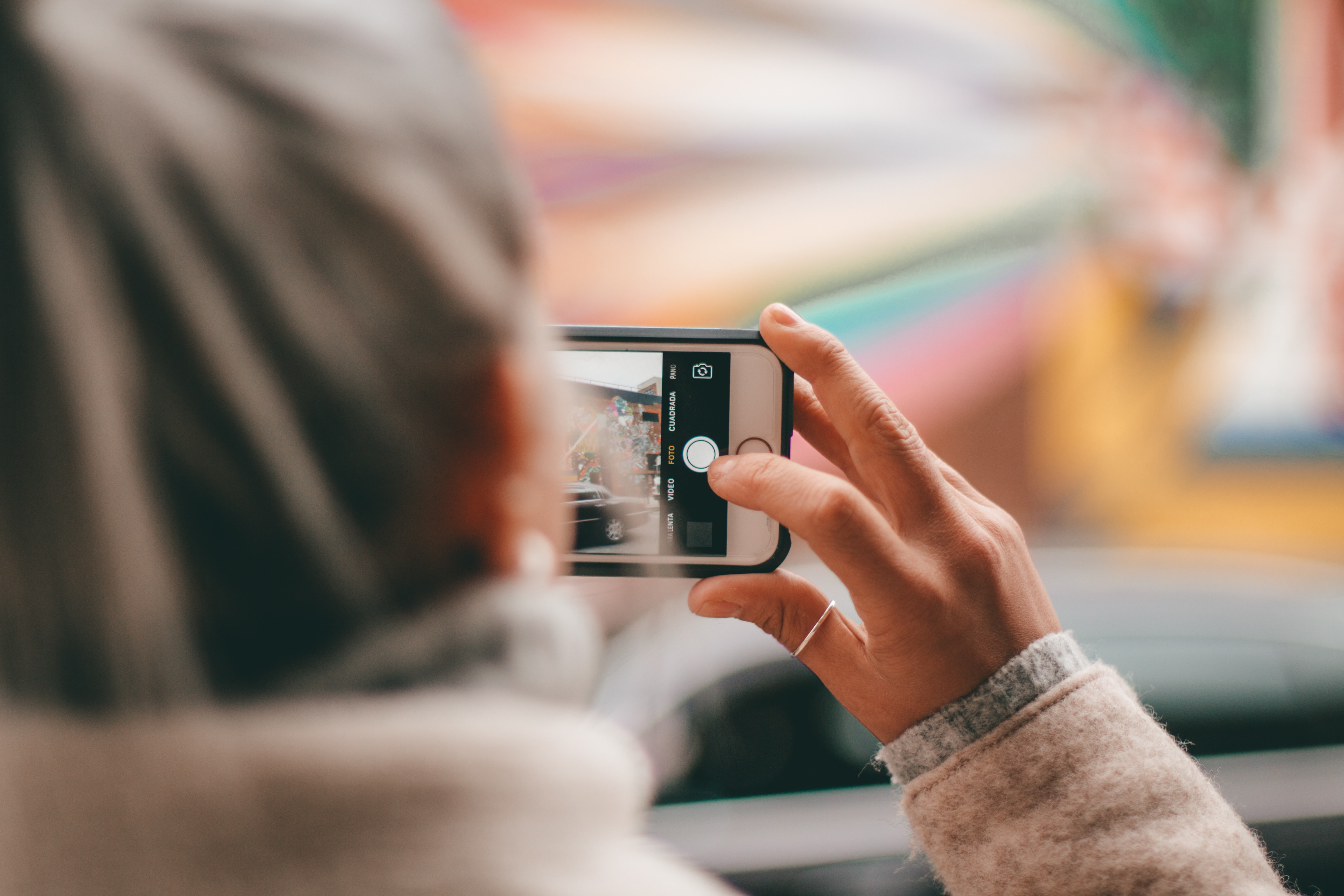 A person taking a picture on their phone