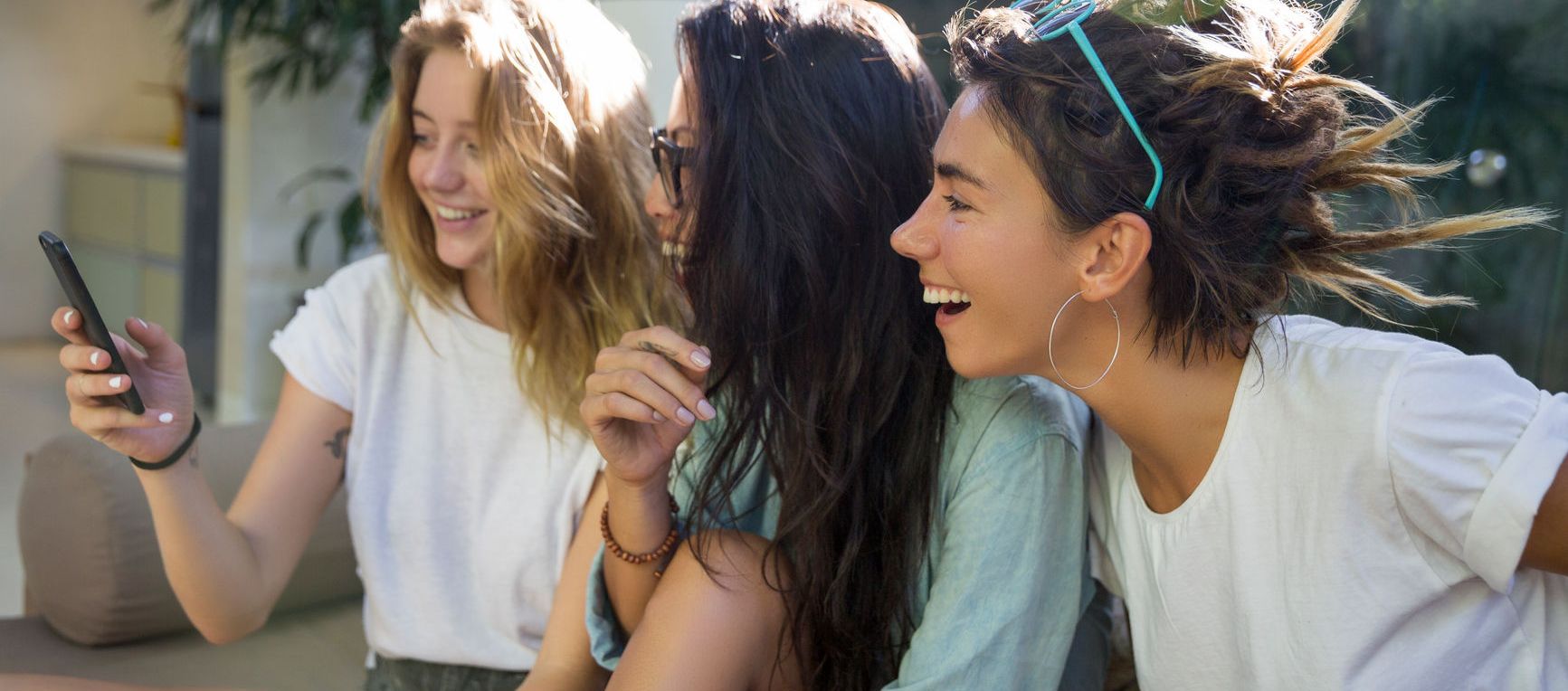 Three Girlfriends Taking A Selfie Together