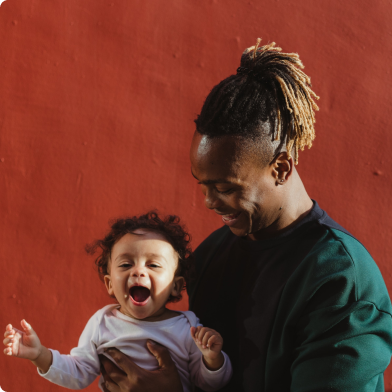 Man with laughing baby