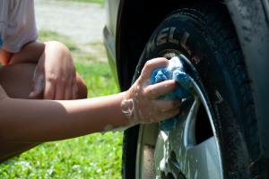 Person washing a car