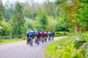 A group of people riding bikes