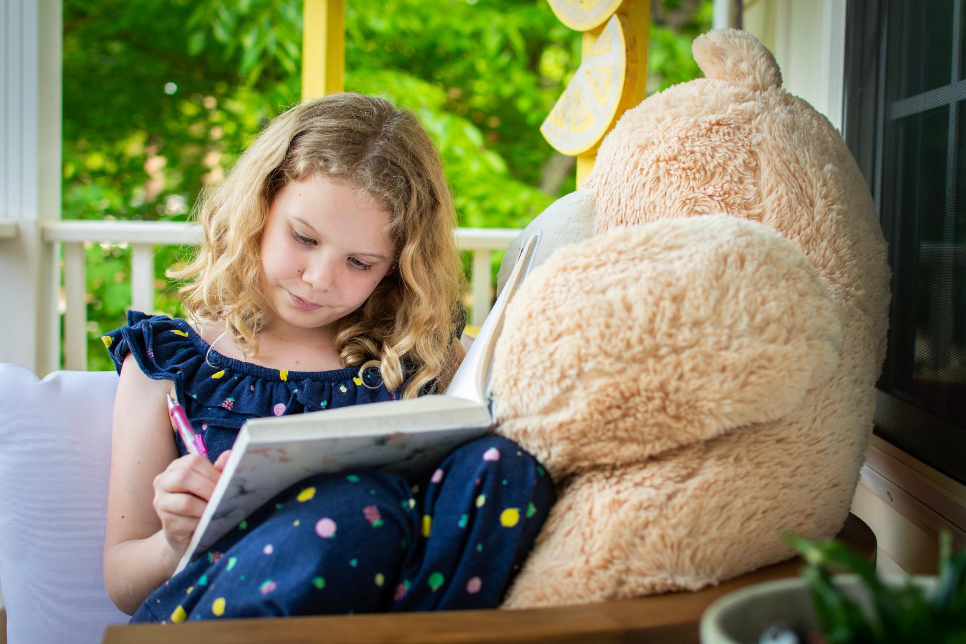 A child writing in a book