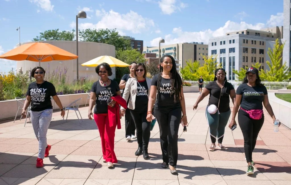 group of black women walking with 