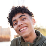 close up of a man smiling