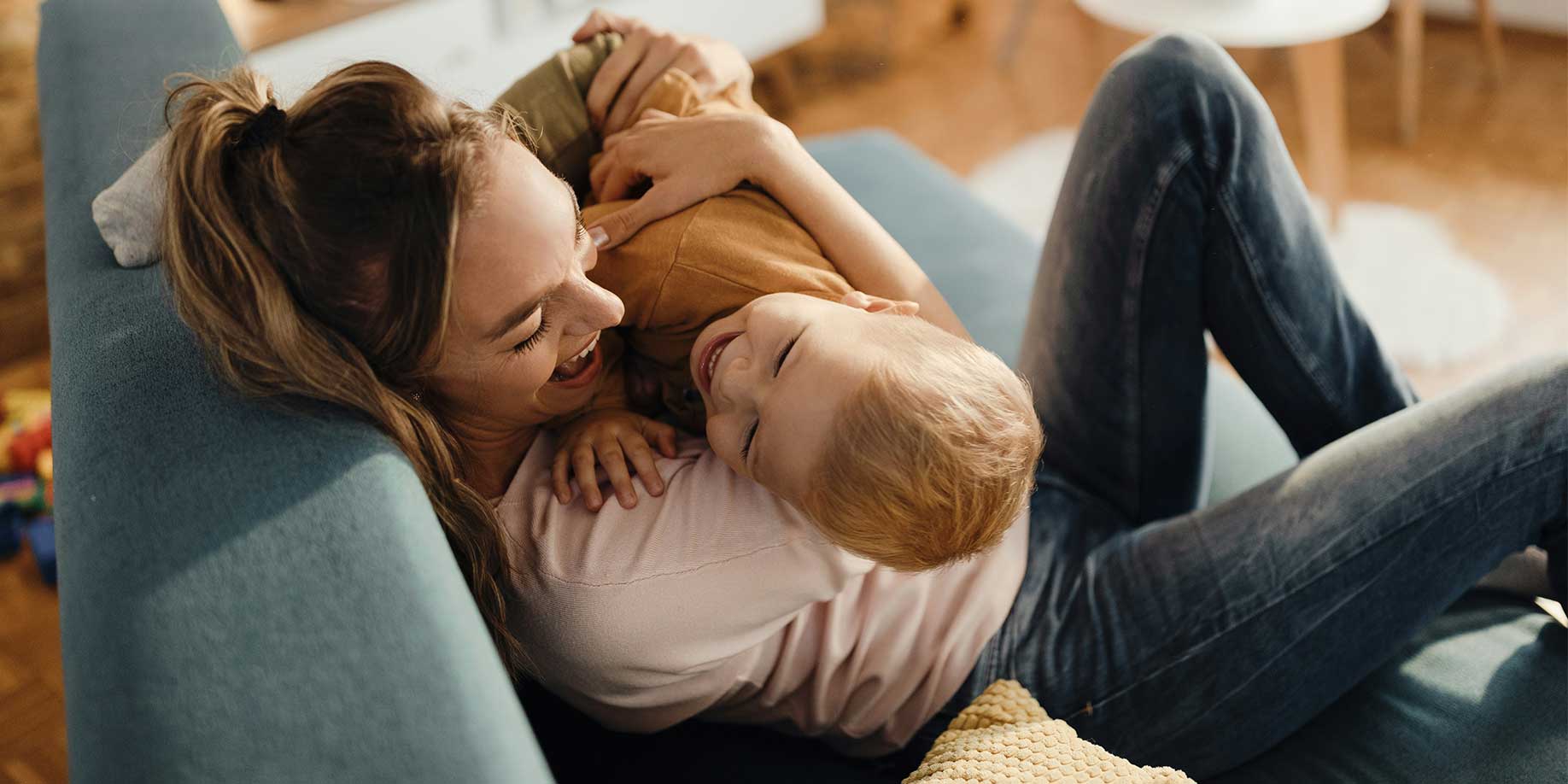A mother playing with her son