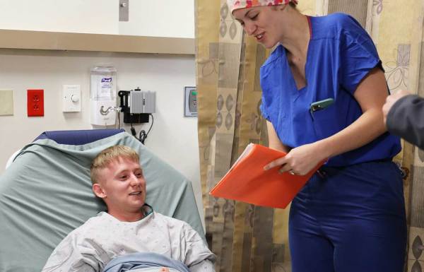 Patient with a doctor post surgery