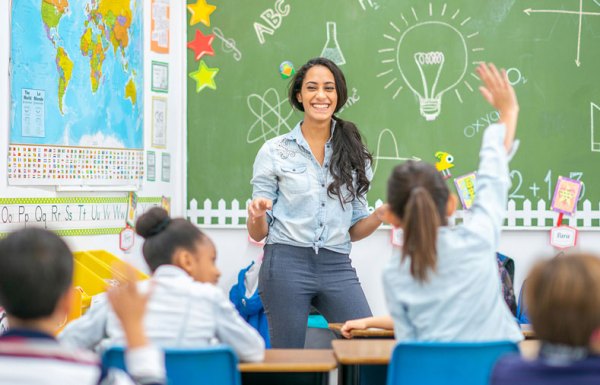 A teacher asking a question to her students