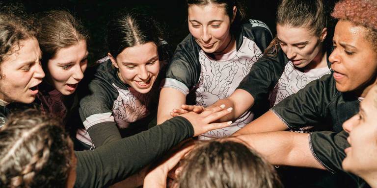 Sports team huddle