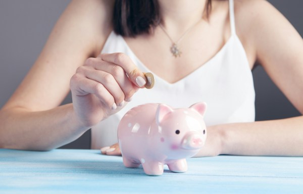 Woman with a piggy bank