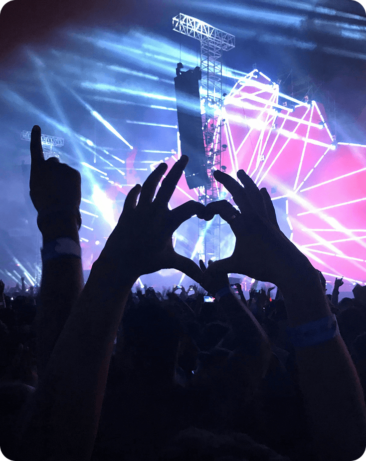 Hands in the shape of a heart at an event