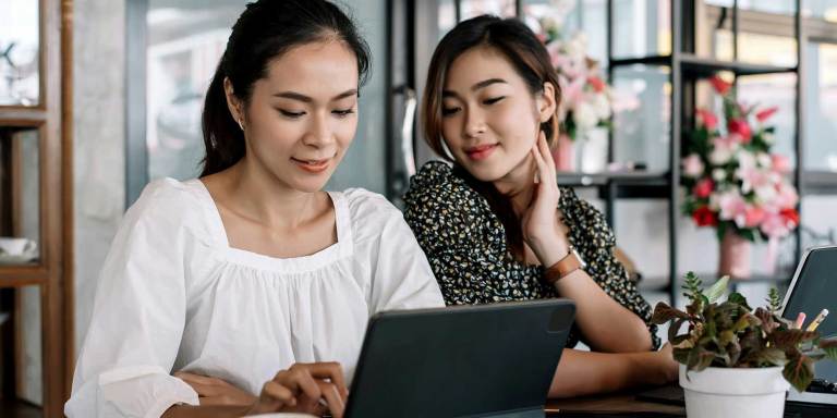 Two women on the computer