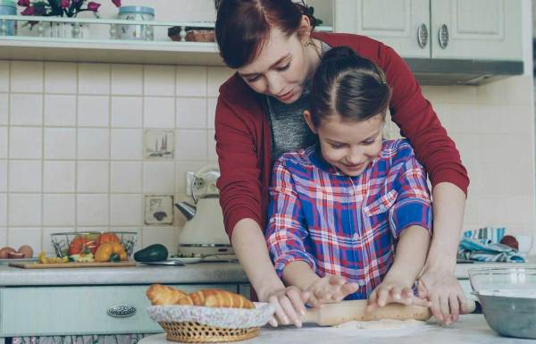Mother baking with her daughter