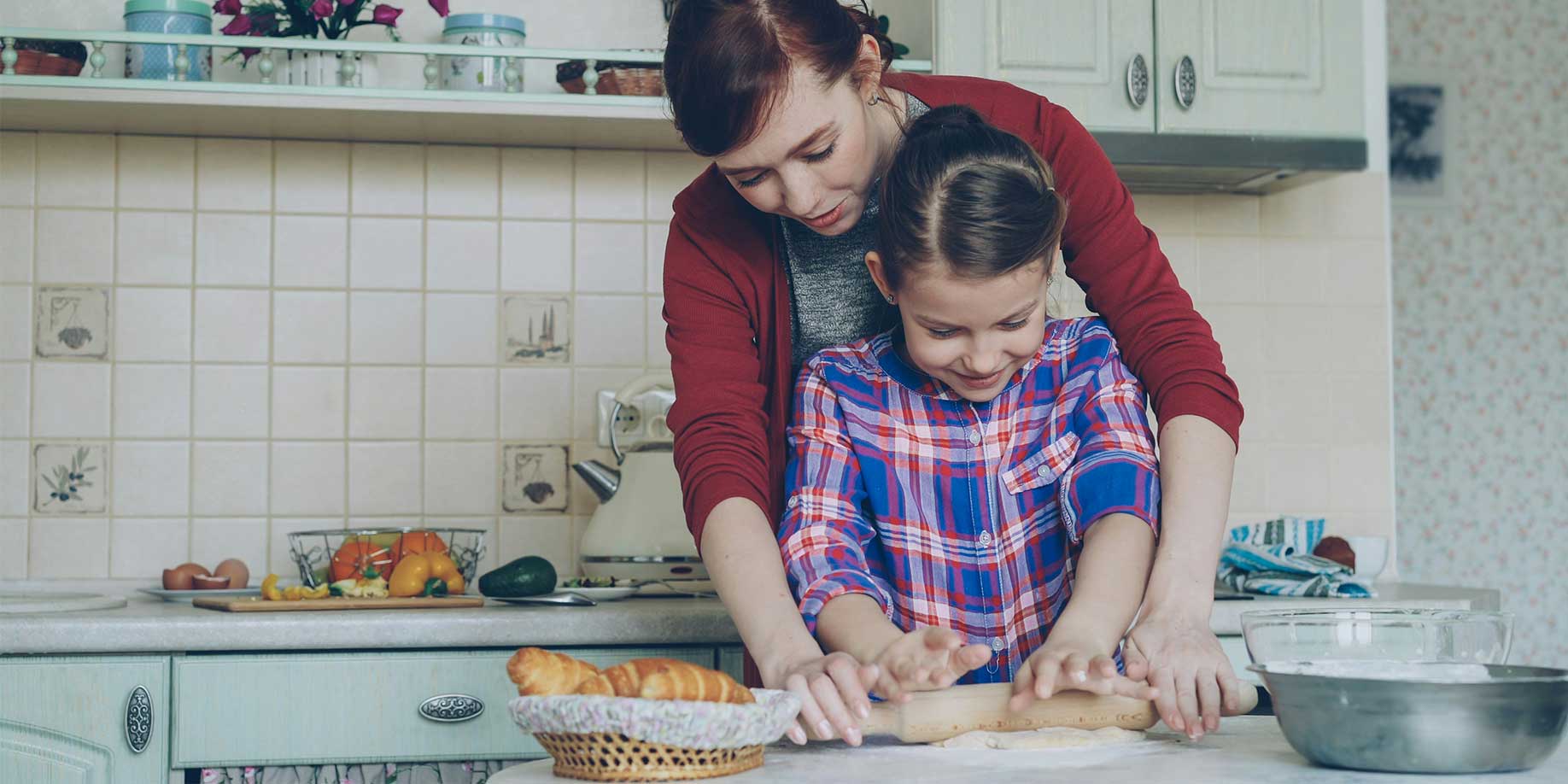 Mother baking with her daughter