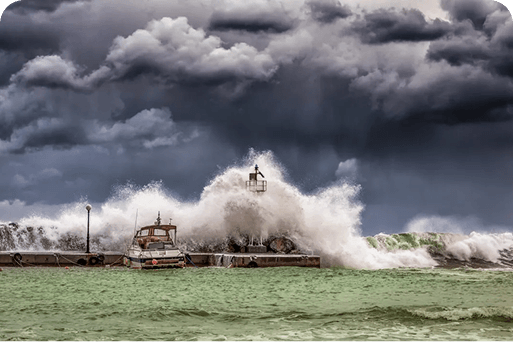 A wave crashing on a dock