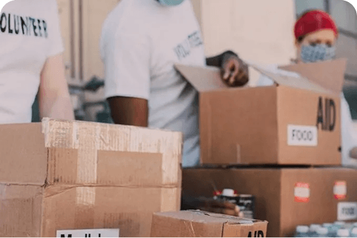Volunteers packing donations