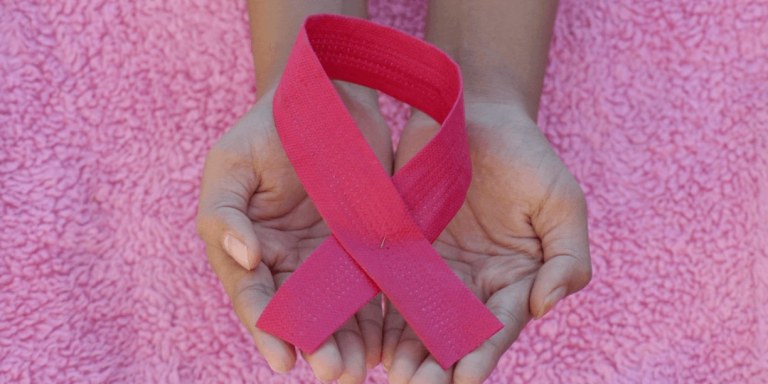 A pink ribbon representing Breast Cancer awareness month