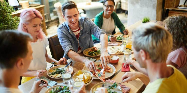 Friends have a sober dinner together