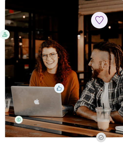 Man and woman working on a laptop