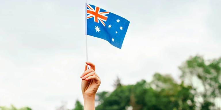Person holding an Australian flag
