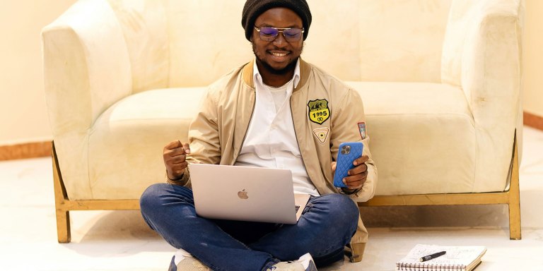 Man with his laptop and his cellphone