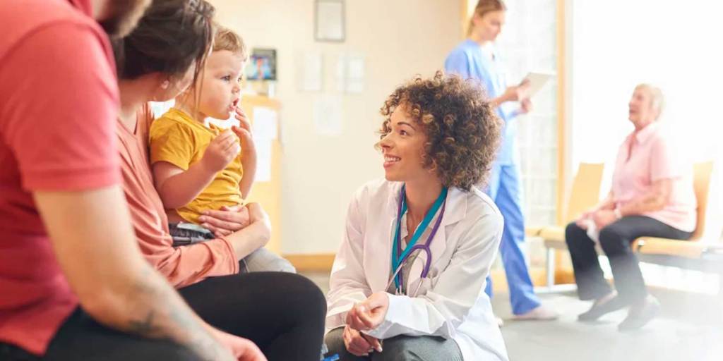 Doctor talking with a family