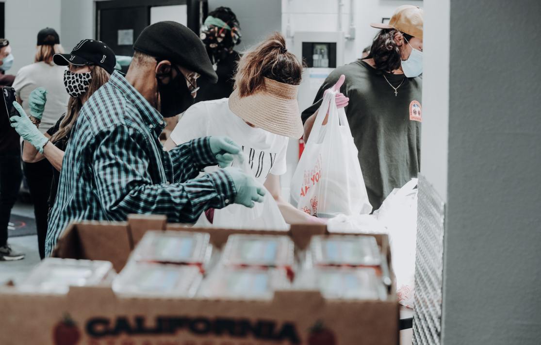People picking up care packages