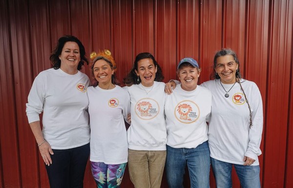 Group of people in front of a stage