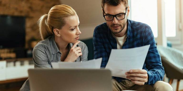 A couple doing their taxes