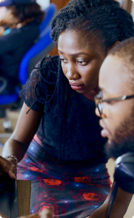 Coworkers looking at a computer