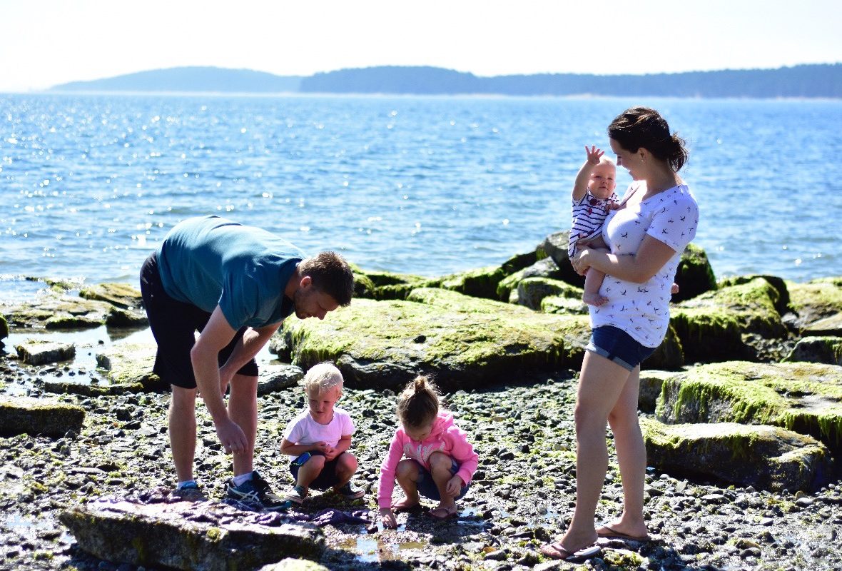 Chase and his family by the water