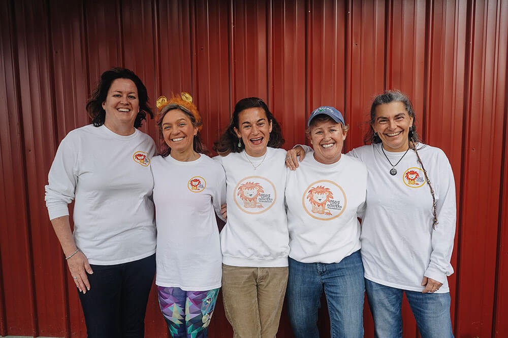 Group of people in front of a stage