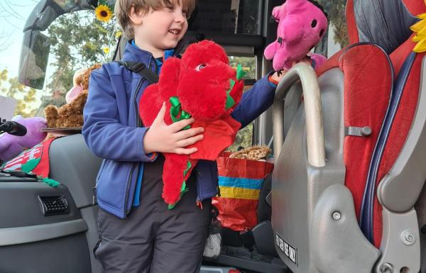 Child holds new toy