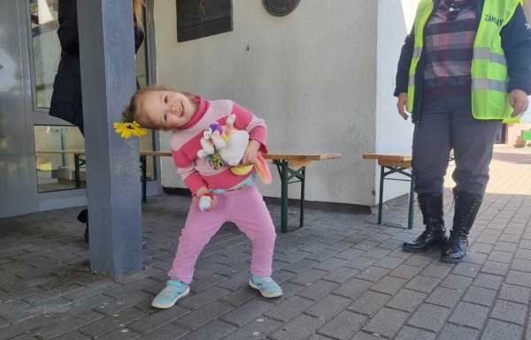 Kid holds new toy