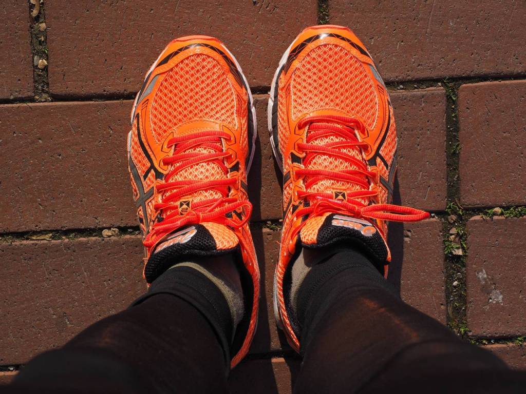 Orange running shoes