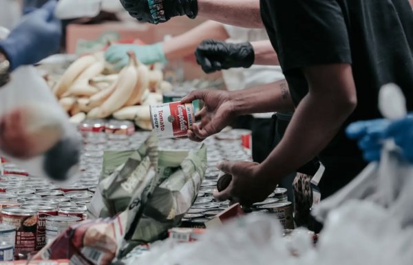 volunteers packing food goods