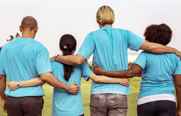 volunteers arm in arm