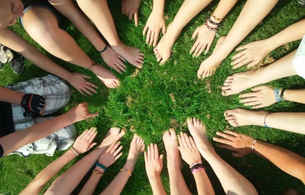 hands in grass