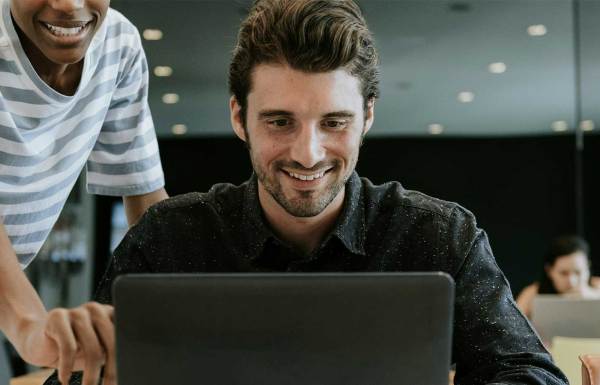 A friend helping a person with their fundraising email