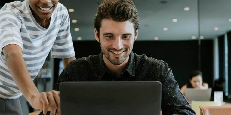 A friend helping a person with their fundraising email