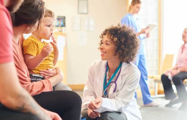 Doctor talking with a family